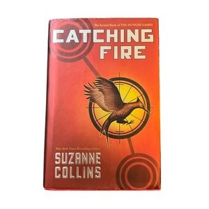 Catching Fire By Suzanne Collins Hardcover Book